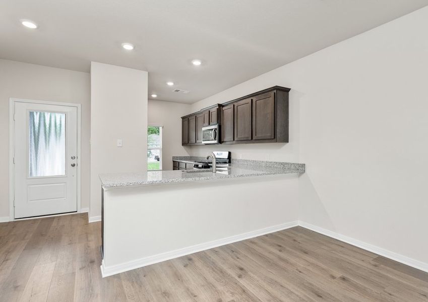 The kitchen of the Driftwood has beautiful granite cabinetry. The kitchen of the Driftwood has beautiful granite cabinetry.