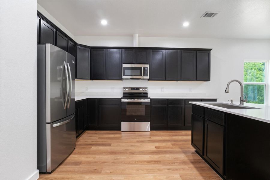 Furnished interior view inside a new home in , Splendora (Image 10).