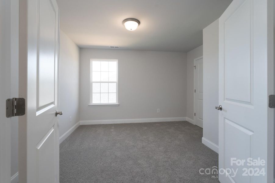 Upstairs Office/Bedroom. Photo representation. Colors and options will differ.