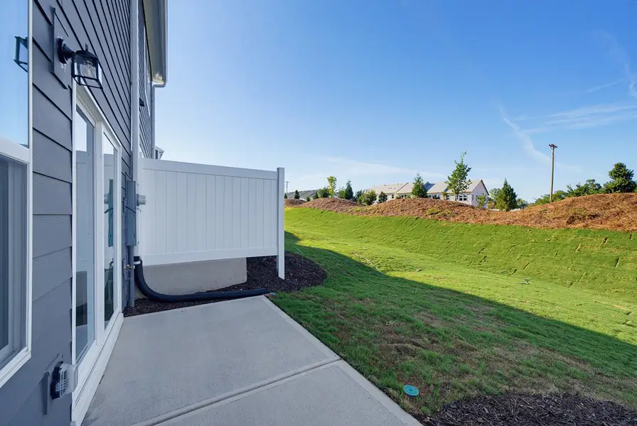 Exterior details and patio area of a home in Sweetbrier, Durham (Image 3).