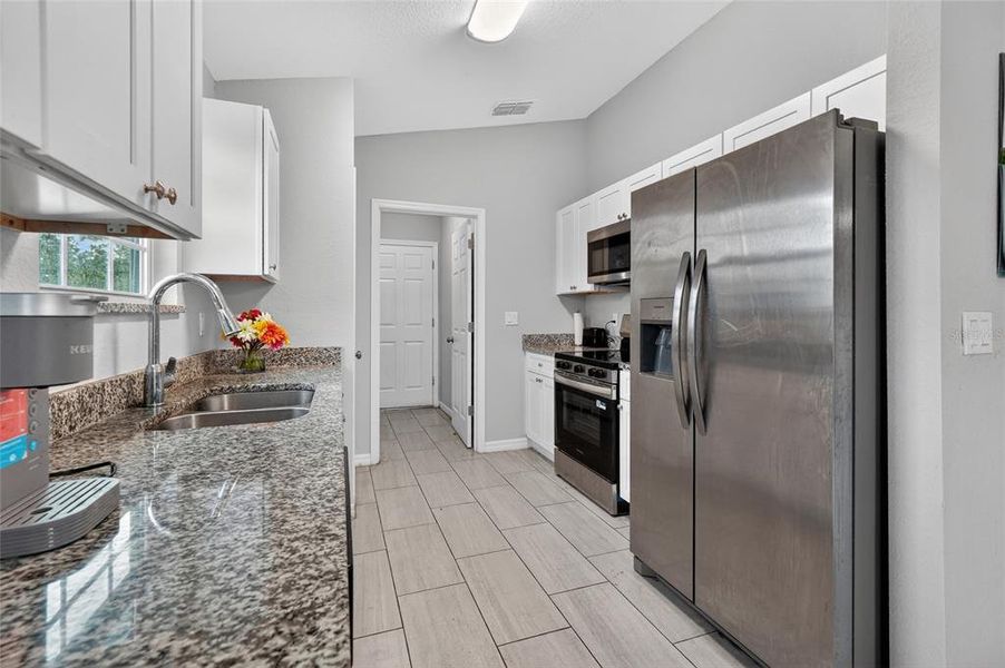 Furnished interior view inside a new home in , Dunnellon (Image 5).