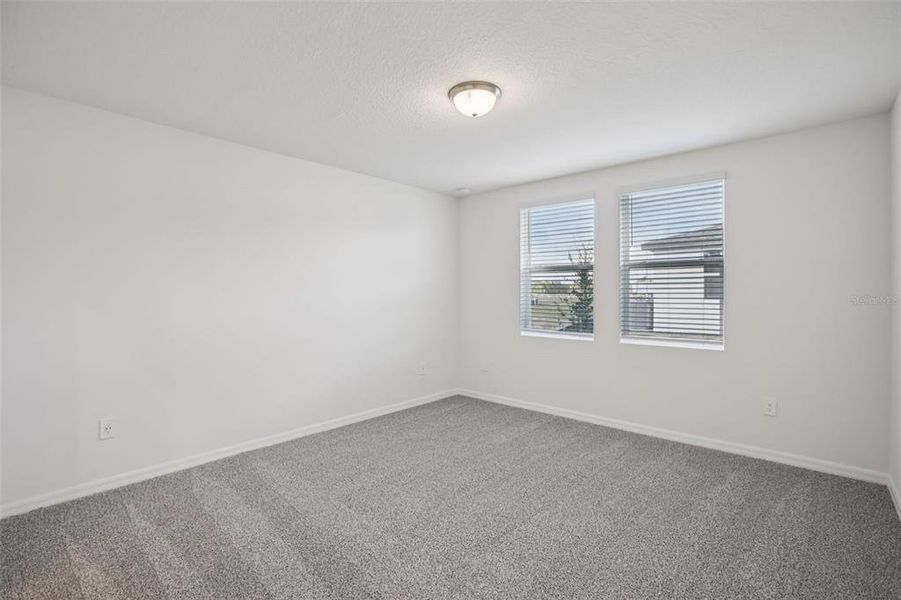 Spacious, unfurnished interior of a new home in Villamar - Classic Series, Winter Haven (Image 31).