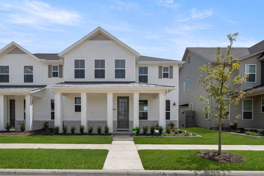 Front exterior of a new home in Terrace Collection at Harvest, Argyle, TX, highlighting curb appeal (Image 1). Front exterior of a new home in Terrace Collection at Harvest, Argyle, TX, highlighting curb appeal (Image 1).