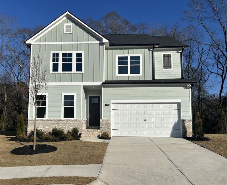 Front exterior of a new home in Red Bird Manor, Jefferson, GA, highlighting curb appeal (Image 1). Front exterior of a new home in Red Bird Manor, Jefferson, GA, highlighting curb appeal (Image 1).
