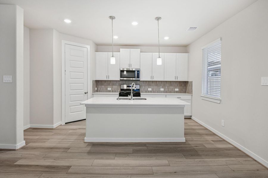 Furnished interior view inside a new home in Spring Brook Village - City Series, Houston (Image 7). Furnished interior view inside a new home in Spring Brook Village - City Series, Houston (Image 7).
