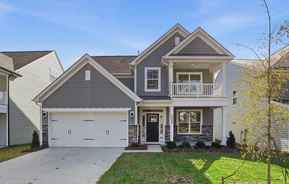Front exterior of a new home in Grier Meadows, Charlotte, NC, highlighting curb appeal (Image 2).