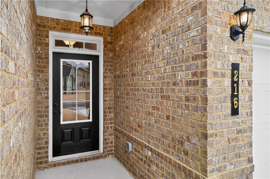 Exterior details and patio area of a home in The Fairways at Mirror Lake, Villa Rica (Image 3).