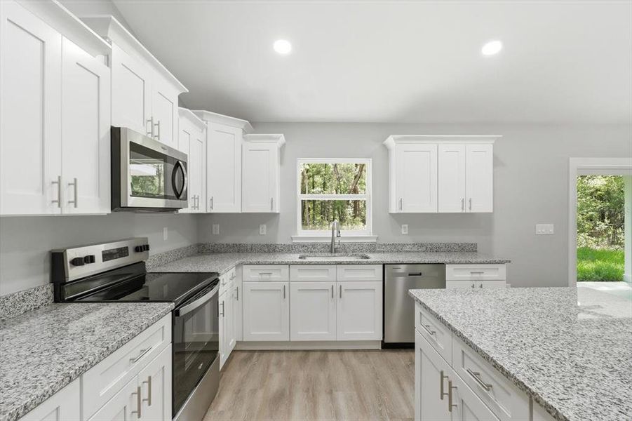 Furnished interior view inside a new home in , Dunnellon (Image 9).