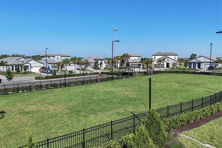 Front exterior of a new home in Sweetwater at Lakewood Ranch, Bradenton, FL, highlighting curb appeal (Image 30).