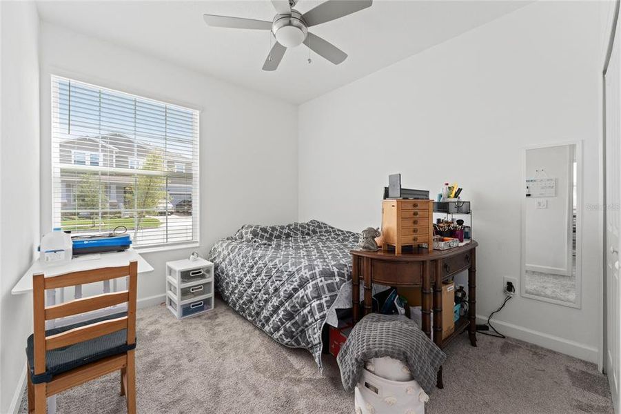 Furnished interior view inside a new home in Storey Park: Innovation Manor Collection, Orlando (Image 22).