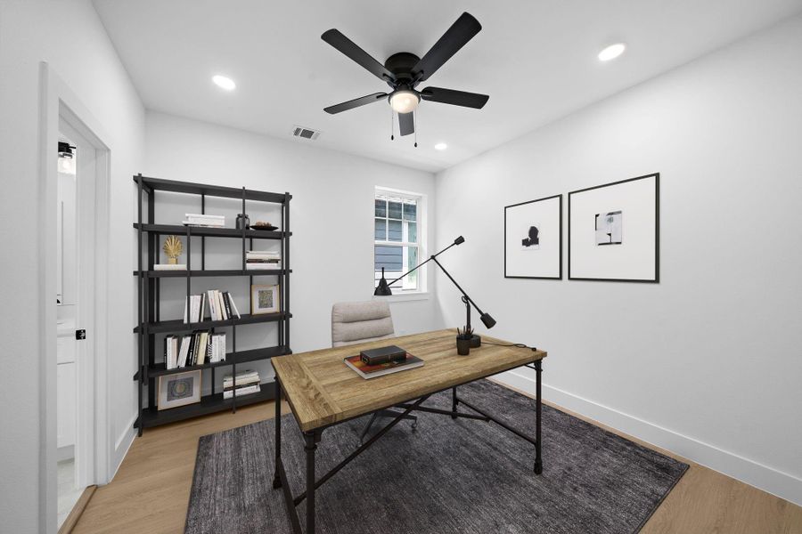 Staged photo of secondary bedroom. The room has natural light from a 2 windows great for an office space. Staged photo of secondary bedroom. The room has natural light from a 2 windows great for an office space.
