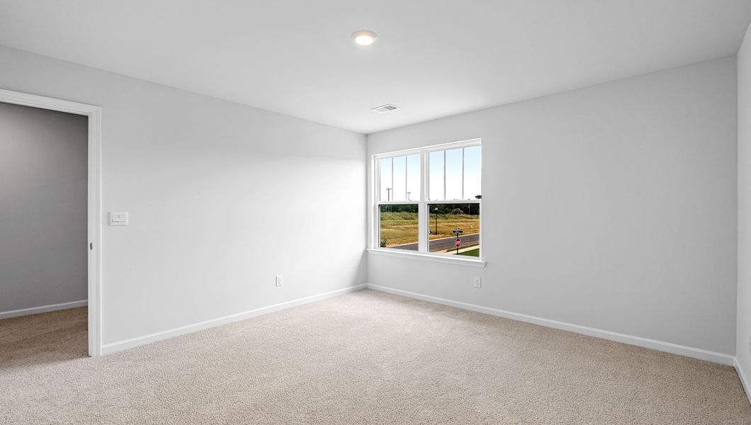 Spacious, unfurnished interior of a new home in Bentley Park, Greenwood (Image 25).