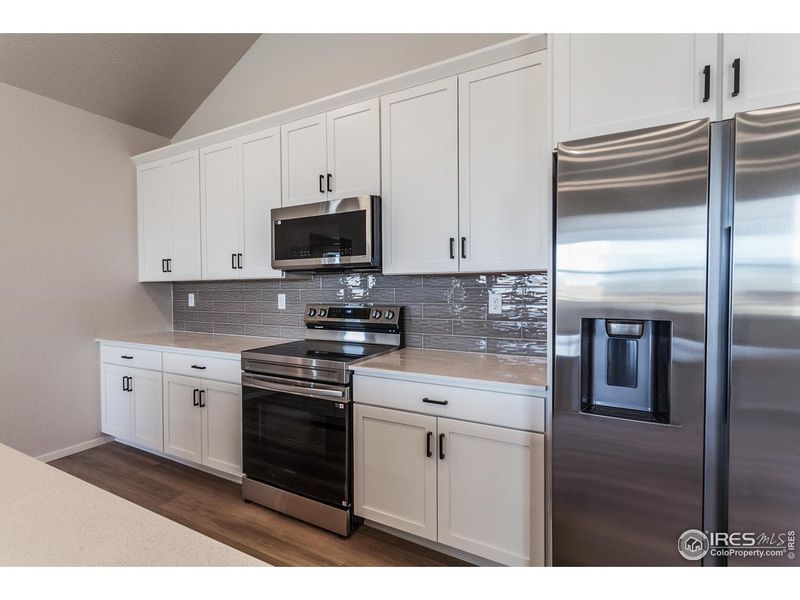 Furnished interior view inside a new home in Raindance Condos, Windsor (Image 6).