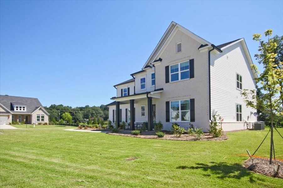 Front exterior of a new home in , Cumming, GA, highlighting curb appeal (Image 22).