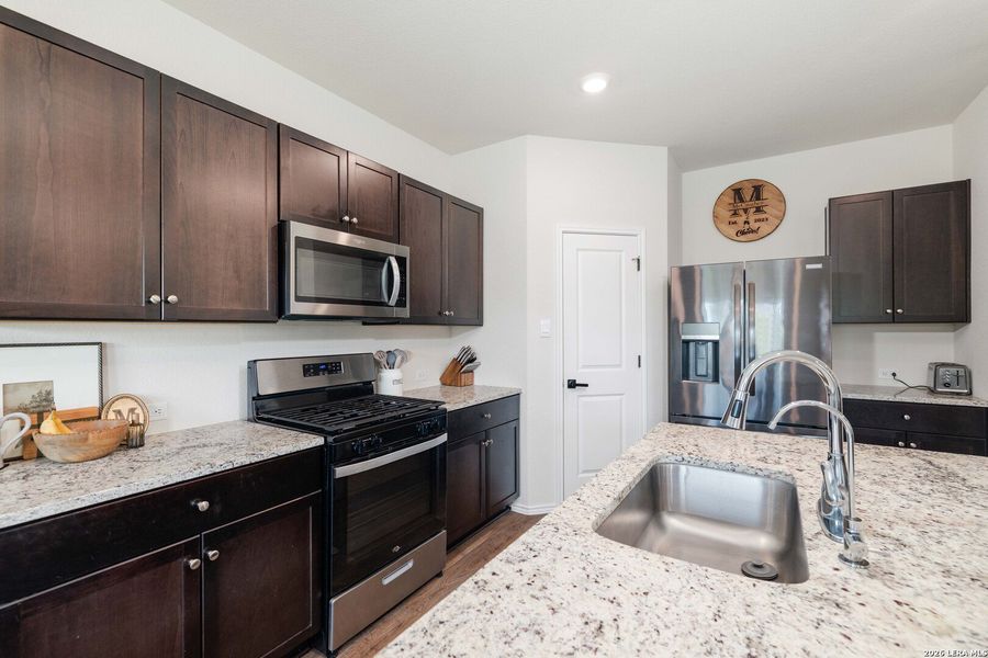Furnished interior view inside a new home in , San Antonio (Image 28).