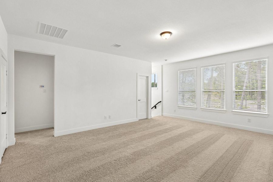 Spacious, unfurnished interior of a new home in The Highlands, Porter (Image 18).