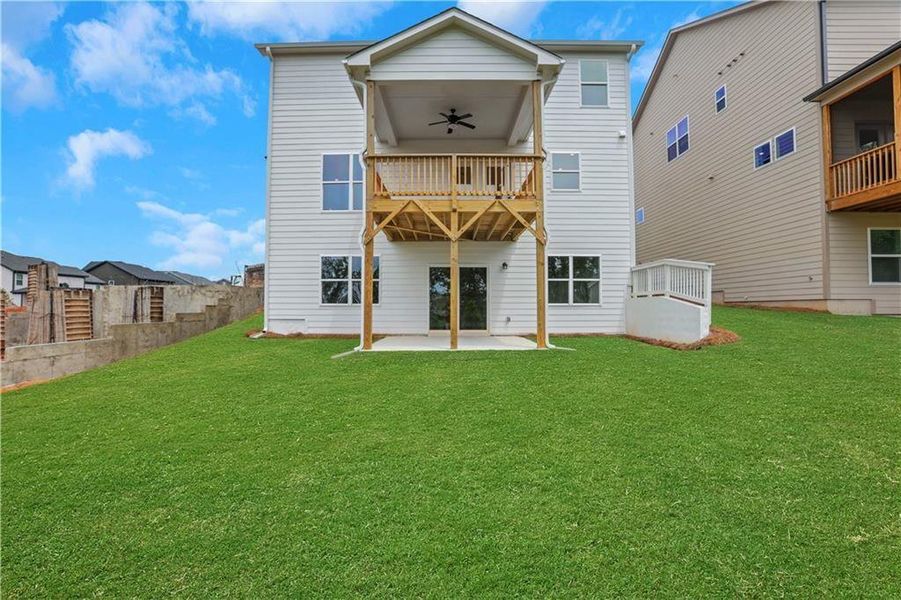 Front exterior of a new home in Twin Lakes, Hoschton, GA, highlighting curb appeal (Image 24). Front exterior of a new home in Twin Lakes, Hoschton, GA, highlighting curb appeal (Image 24).
