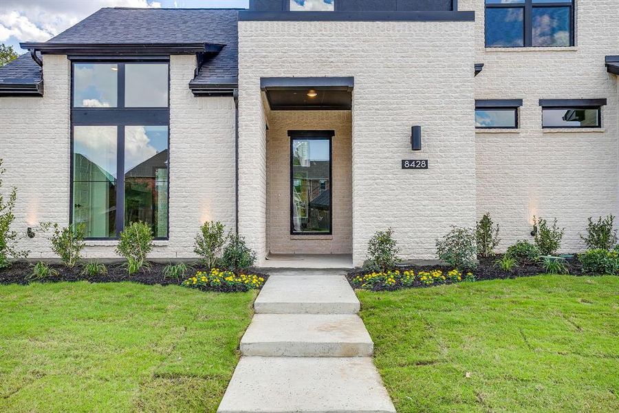 Exterior details and patio area of a home in St. Joseph Estates, North Richland Hills (Image 3).