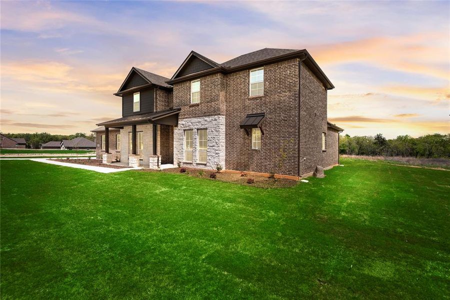 Front exterior of a new home in Crystal Springs Estates, Alvarado, TX, highlighting curb appeal (Image 24).