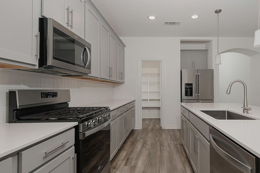 Furnished interior view inside a new home in Mavera, Conroe (Image 8).