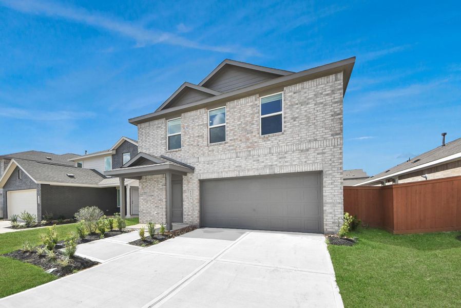 Front exterior of a new home in Emberly, Beasley, TX, highlighting curb appeal (Image 20). Front exterior of a new home in Emberly, Beasley, TX, highlighting curb appeal (Image 20).