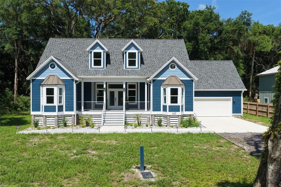 Front exterior of a new home in , Palm Coast, FL, highlighting curb appeal (Image 2). Front exterior of a new home in , Palm Coast, FL, highlighting curb appeal (Image 2).