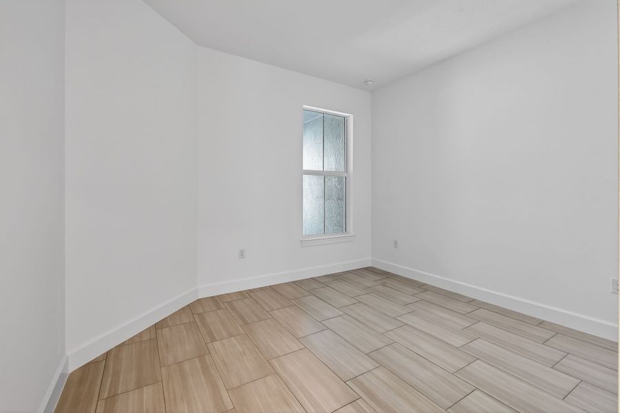 Spacious, unfurnished interior of a new home in Costa Pointe, Vero Beach (Image 44).