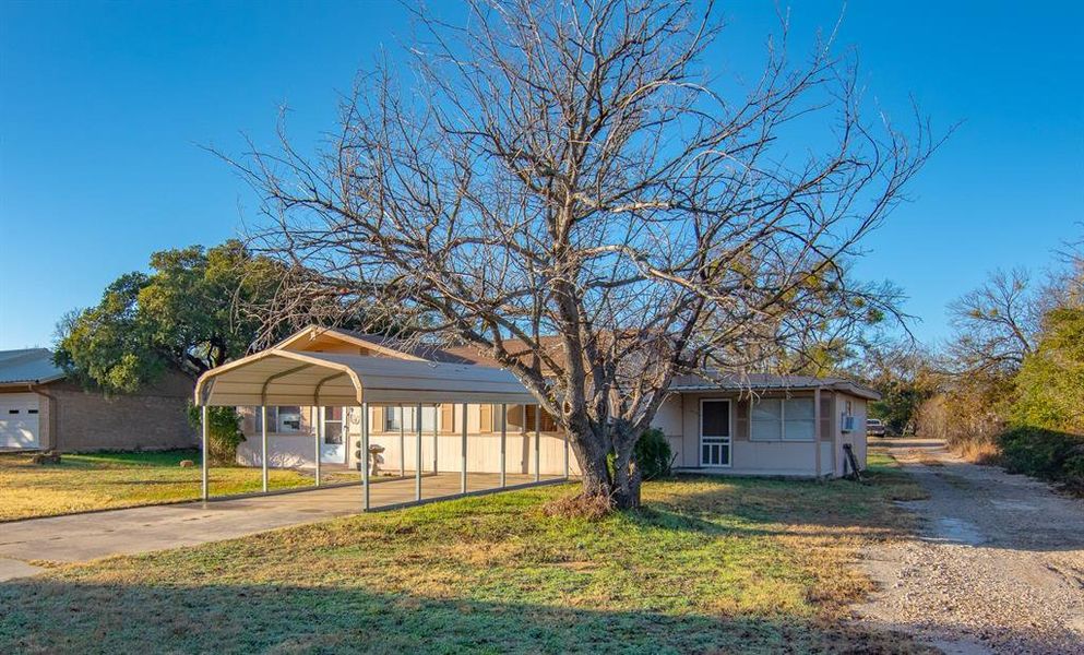 Exterior details and patio area of a home in , Brownwood (Image 13). Exterior details and patio area of a home in , Brownwood (Image 13).