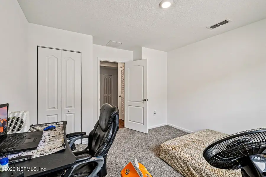 Furnished interior view inside a new home in Cross Creek Express, Green Cove Springs (Image 18).