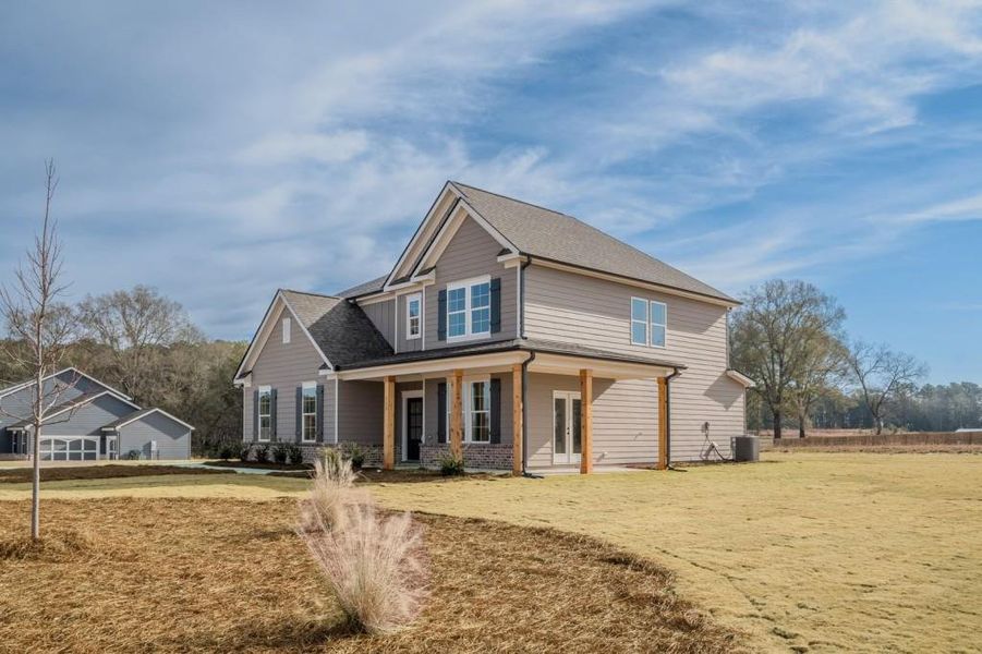 Front exterior of a new home in , Good Hope, GA, highlighting curb appeal (Image 27). Front exterior of a new home in , Good Hope, GA, highlighting curb appeal (Image 27).