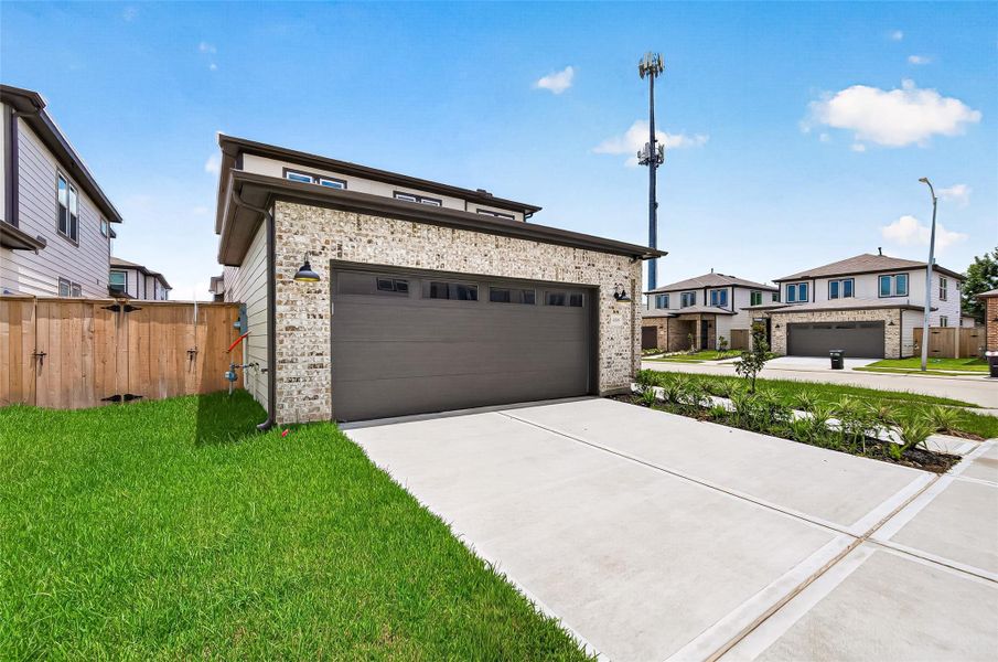 Front exterior of a new home in , Stafford, TX, highlighting curb appeal (Image 1). Front exterior of a new home in , Stafford, TX, highlighting curb appeal (Image 1).