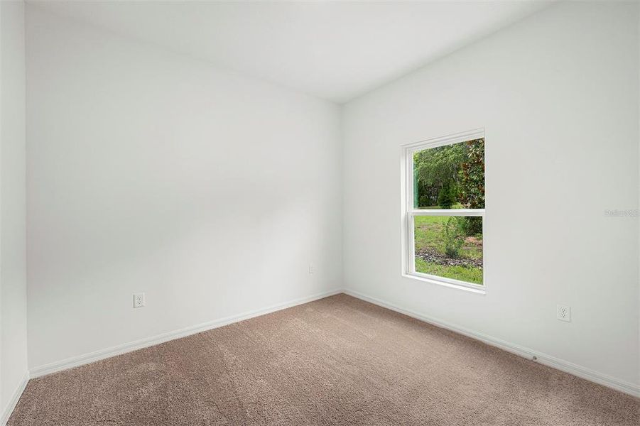 Spacious, unfurnished interior of a new home in Tula Parc, Astatula (Image 15).