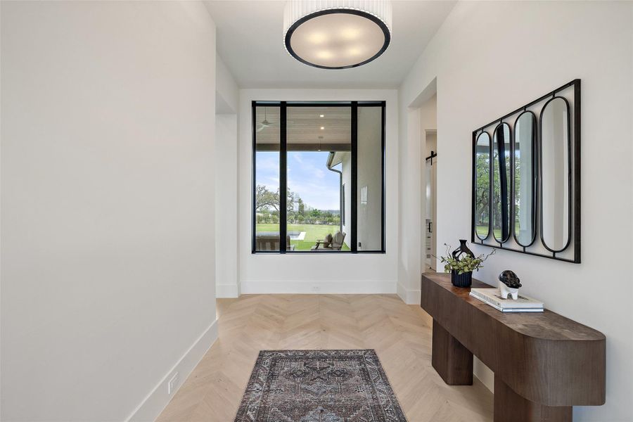 Doorway to outside with baseboards Doorway to outside with baseboards