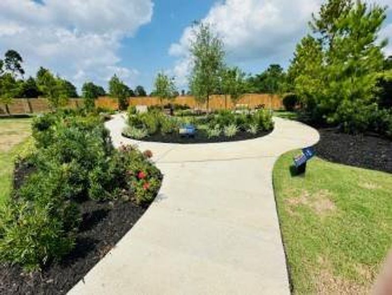 Butterfly garde/park area at front of community provides a great spot to hang out and read a book on a beautiful day!