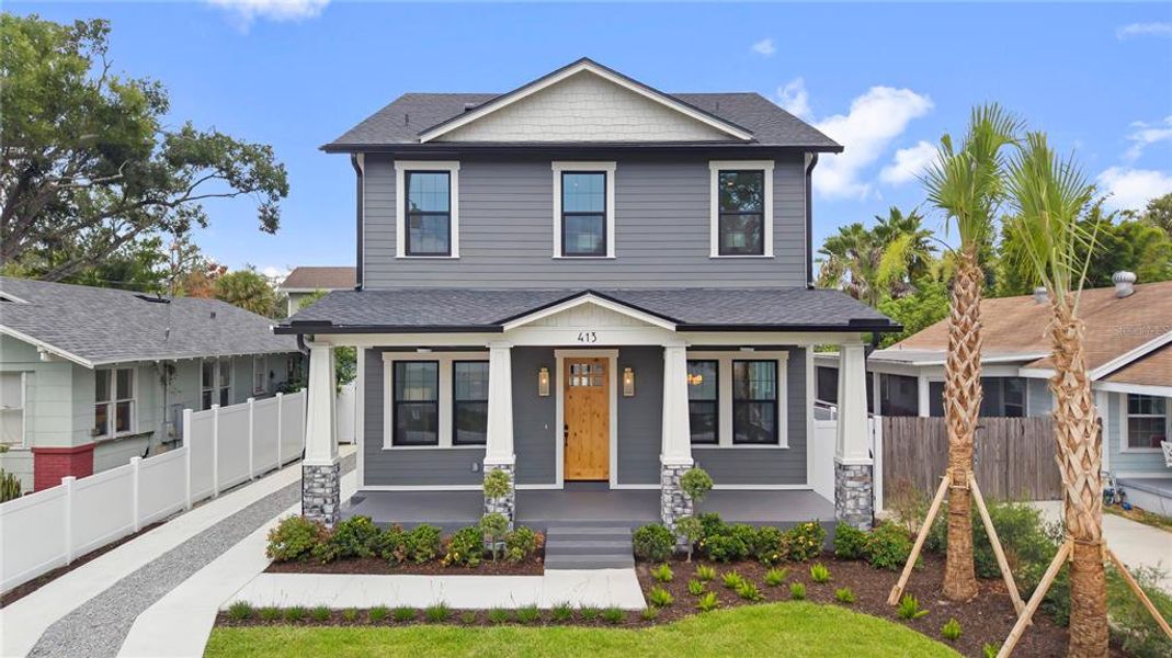 Front exterior of a new home in , Tampa, FL, highlighting curb appeal (Image 30). Front exterior of a new home in , Tampa, FL, highlighting curb appeal (Image 30).