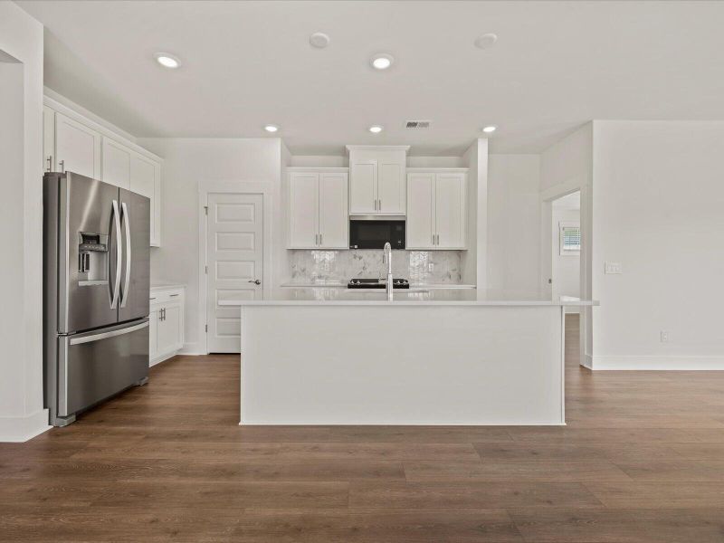 Furnished interior view inside a new home in The Coves at Lakes of Cane Bay, Summerville (Image 14).