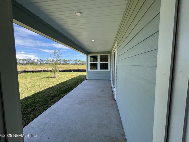 Spacious, unfurnished interior of a new home in The Cypress Series at Reserve East, Flagler Beach (Image 12).