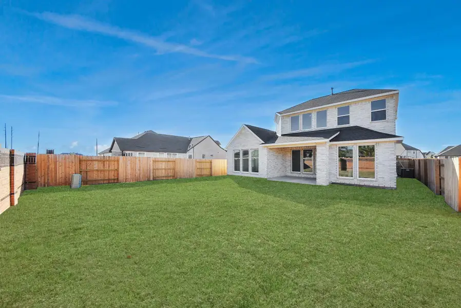 Exterior details and patio area of a home in Elyson, Katy (Image 28).