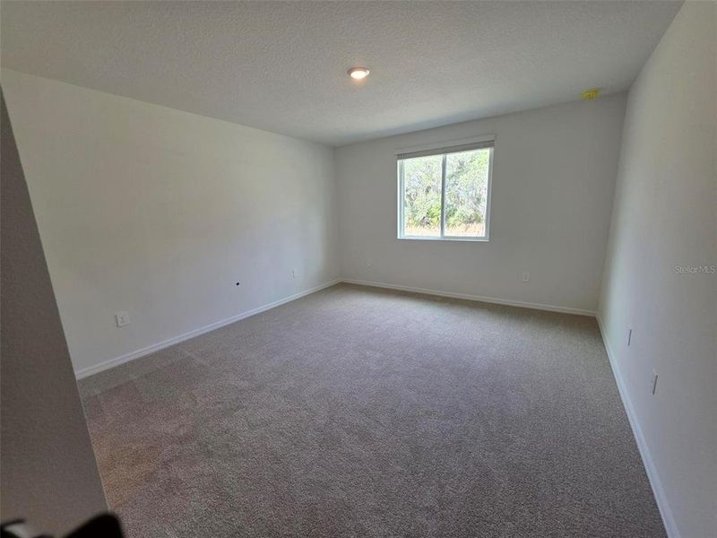 Spacious, unfurnished interior of a new home in Magnolia Bay - Classic Series, Nokomis (Image 10).