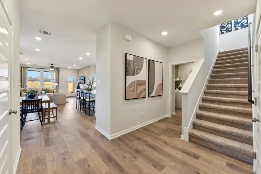 A large room with wood floors. A large room with wood floors.