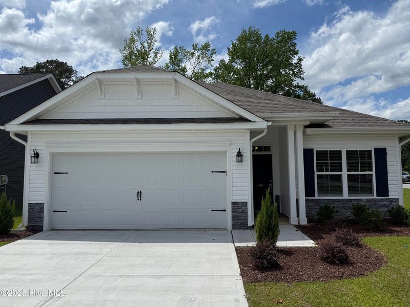 Front exterior of a new home in Waverly Place, Richlands, NC, highlighting curb appeal (Image 1). Front exterior of a new home in Waverly Place, Richlands, NC, highlighting curb appeal (Image 1).