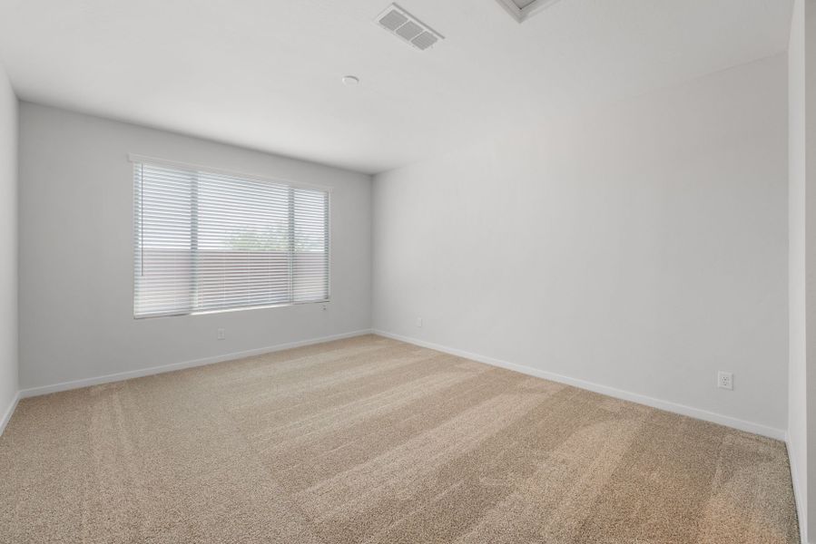 Spacious, unfurnished interior of a new home in Blossom Rock, Apache Junction (Image 24).