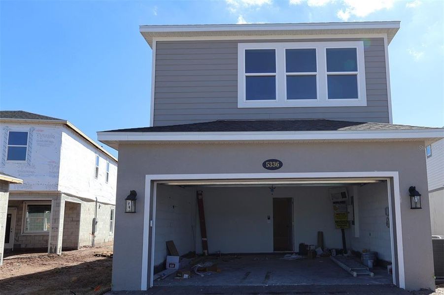 In-progress construction of a new home in Center Lake on the Park, St. Cloud, FL (Image 15).