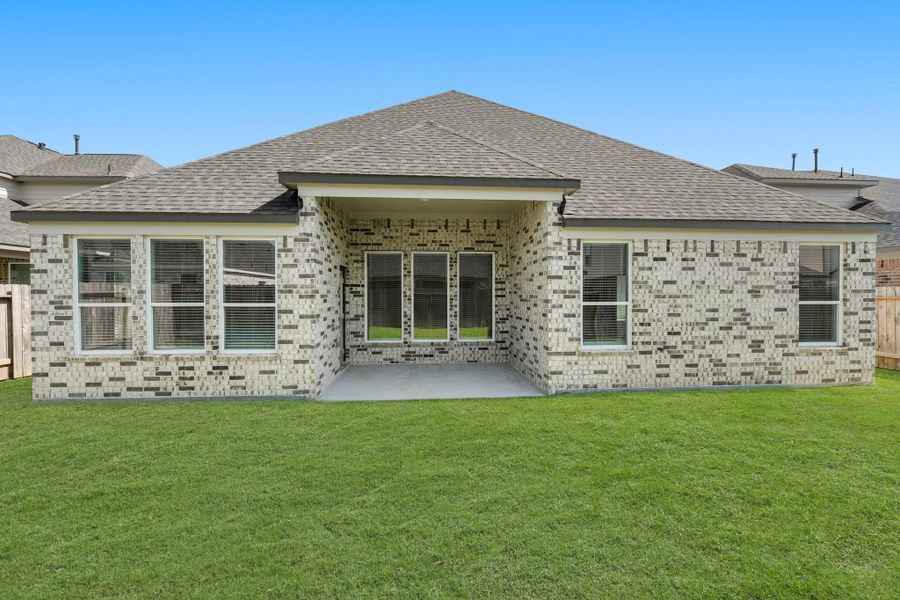 Front exterior of a new home in Briarwood Crossing, Rosenberg, TX, highlighting curb appeal (Image 1). Front exterior of a new home in Briarwood Crossing, Rosenberg, TX, highlighting curb appeal (Image 1).
