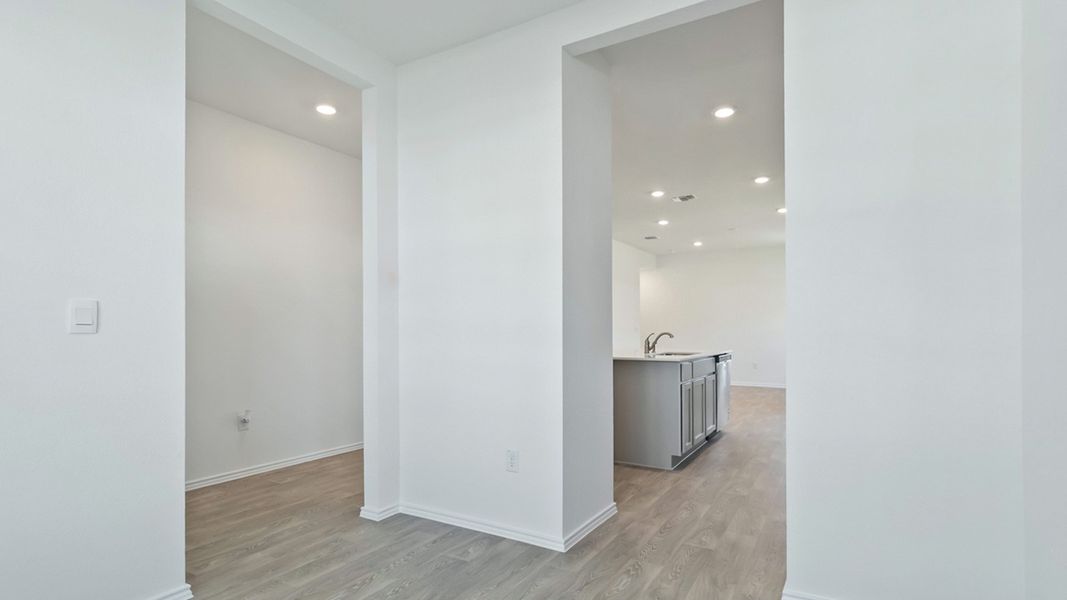 Representative unfurnished interior of a home built from the The Abbot by D.R. Horton in Talavera, Kyle (Image 10).