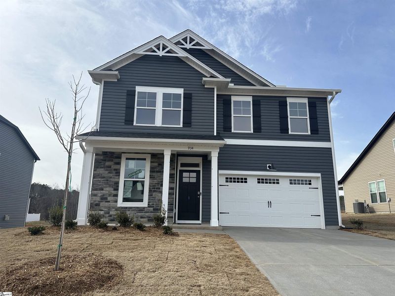 Front exterior of a new home in Shiloh Trail, Wellford, SC, highlighting curb appeal (Image 1). Front exterior of a new home in Shiloh Trail, Wellford, SC, highlighting curb appeal (Image 1).