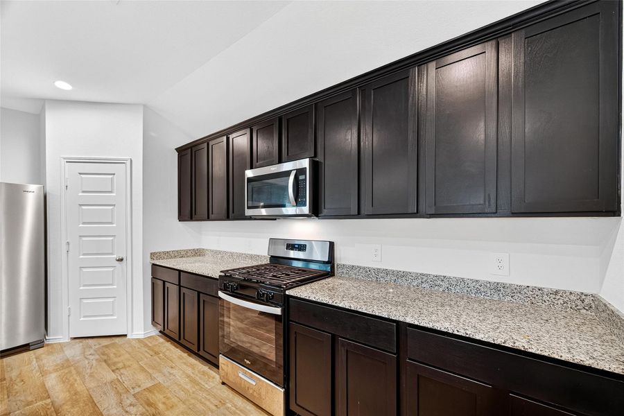 Furnished interior view inside a new home in Windstone on the Prairie, Richmond (Image 9).