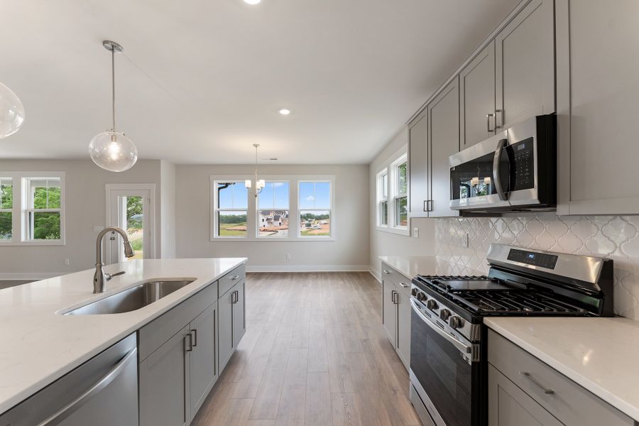 Representative furnished interior of a home built from the MacGregor II by Hunter Quinn Homes in The Meadows at Midway, Anderson (Image 6).