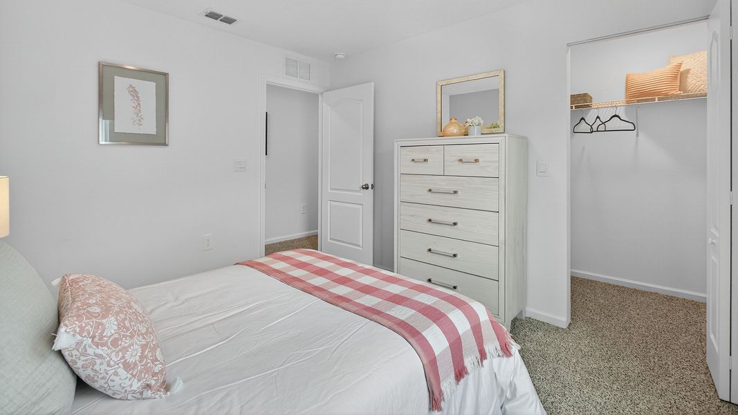 Representative furnished interior of a home built from the Carson by D.R. Horton in Trout River, Jacksonville (Image 15).