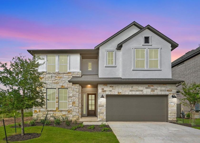 Front exterior of a new home in Wolf Ranch, Georgetown, TX, highlighting curb appeal (Image 1). Front exterior of a new home in Wolf Ranch, Georgetown, TX, highlighting curb appeal (Image 1).